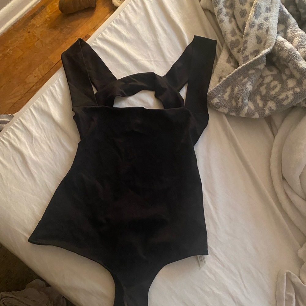 Free people open back body suit NWT